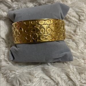 Coach Gold Embossed Cuff Bracelet